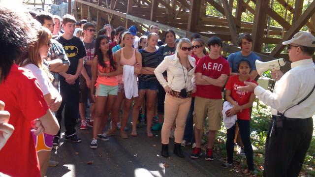 Engineering Scholars students on a trip listening to a tour guide