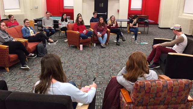 Humanities Scholars students sitting in a circle for book club