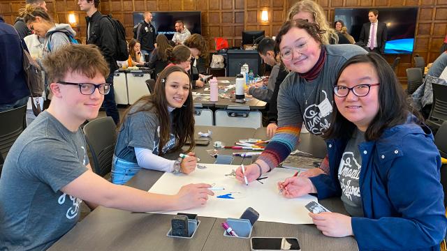 Humanities Scholars students working on a project together