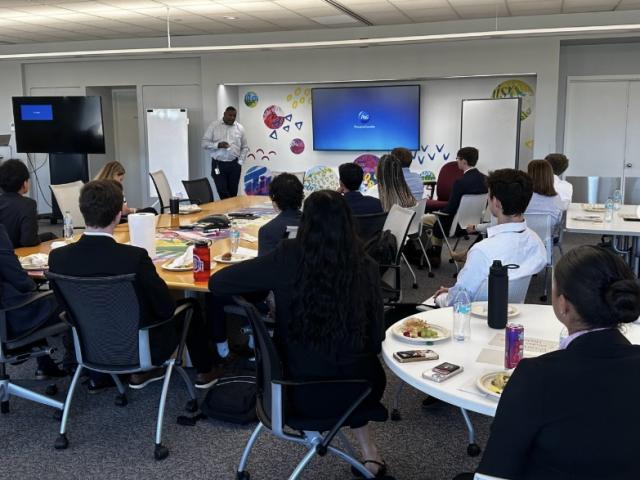 Business Scholars listening to a career presentation 