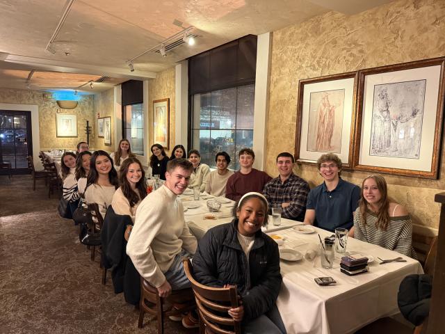 Dunn Sport and Wellness Scholars enjoy a group dinner with their program peers. 
