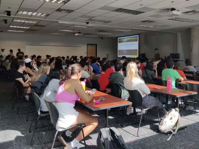 HES students gathered in a classroom for their first meeting of the semester