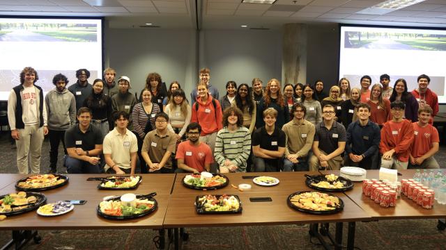 Humanitarian Engineering Scholars gathered together before a community event