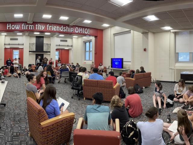 Humanities Scholars gathered in the common area in Baker Hall East