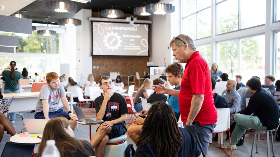 Craig Minnick listens to speaker at LaunchpadOSU
