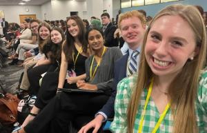 Allison Sachs and other students smile while at PROPEL conference