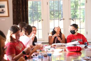 Honors students make Buckeye necklaces 